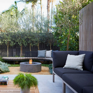 ecosmart fire ark gray fire pit table in a patio