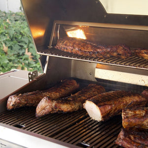 grilling meat on the Fire Magic Echelon E1060i Built-In Gas Grill