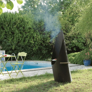 Focus Diagofocus Wood Burning Fire Pit Grill beside the pool