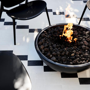 close up on the black modern blaze gas fire bowl