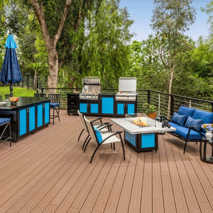 Performance Grilling Systems Legacy S27T Gas Grill built into a a black and blue island