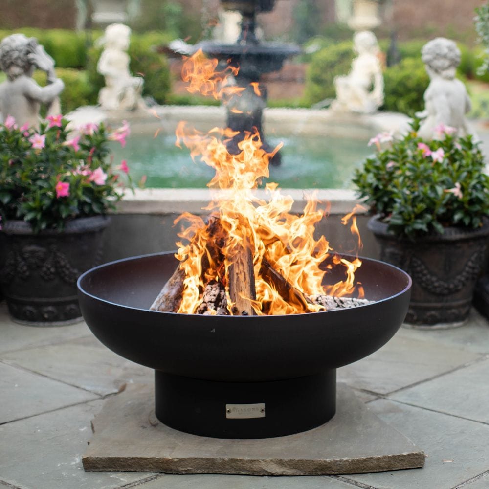 seasons fire pits elliptical steel fire pit in the garden