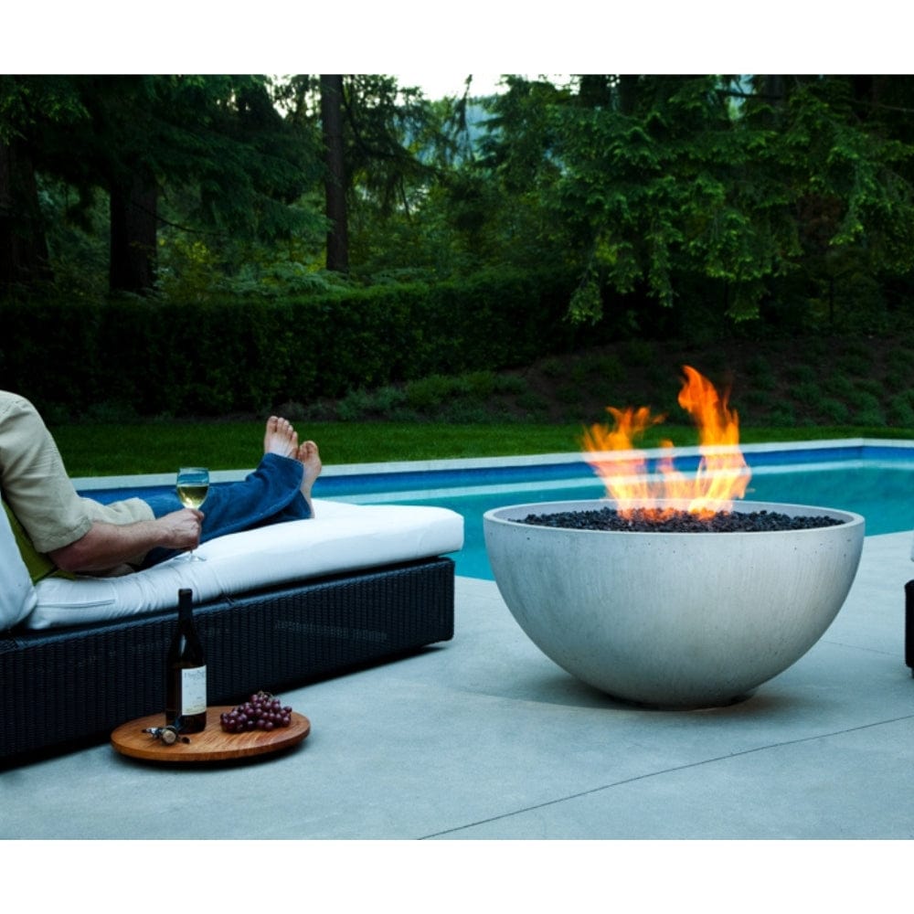 solus hemi gas fire pit by the pool - lifestyle view