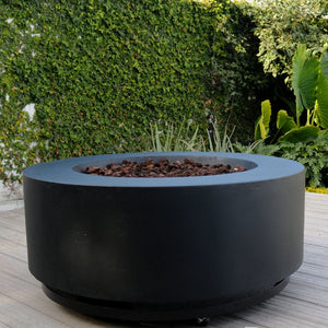 stonelum coliseo 1 round black fire pit on a deck