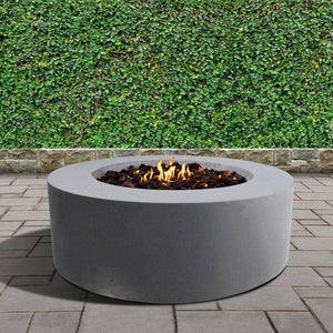 stonelum coliseo 1 round grey gas fire pit in a garden