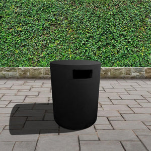 round black tank cover in garden