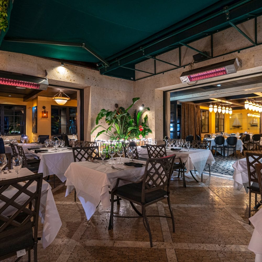 sunpak s34 wall/ceiling mounted infrared gas patio heaters at a restaurant - installation view