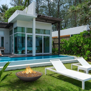 American Fyre Designs Marseille Black Lava Fire Bowl in the garden