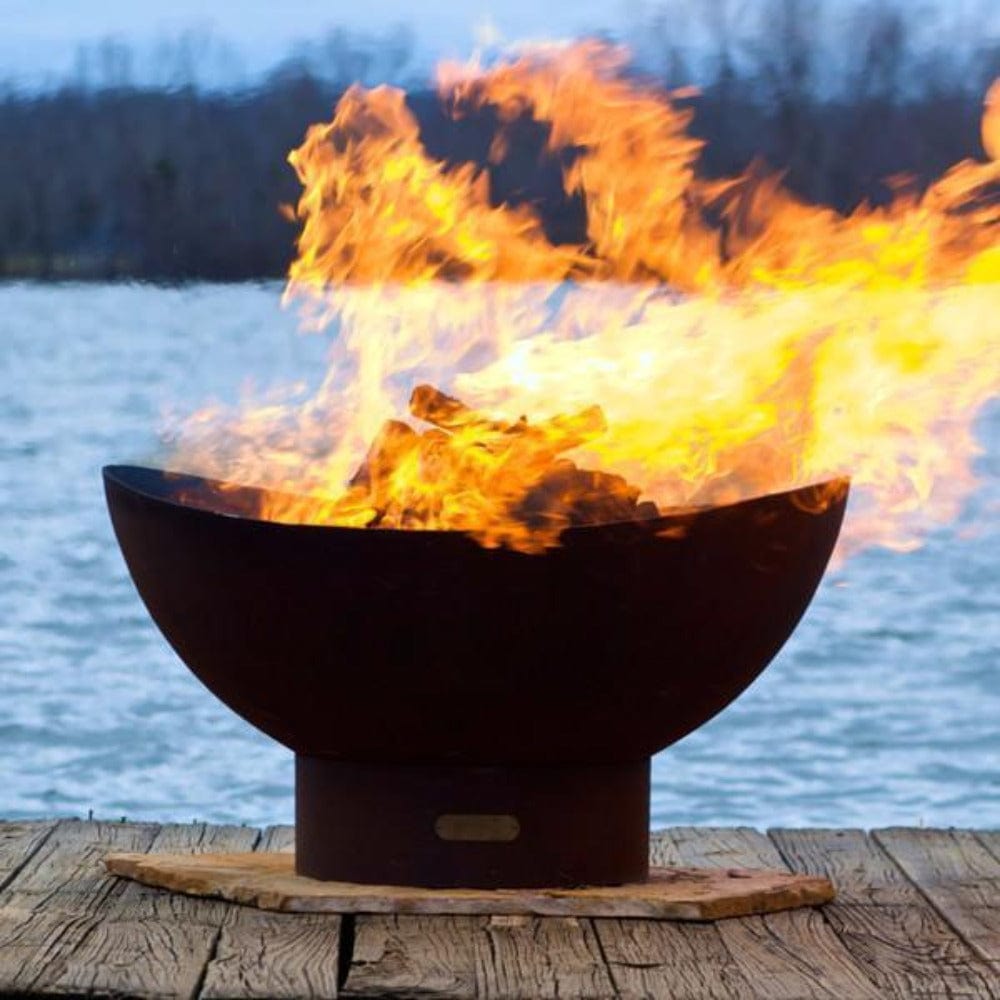 Fire Pit Art Scallop - 36" Handcrafted Carbon Steel Fire Pit (SC) Beside A Lake