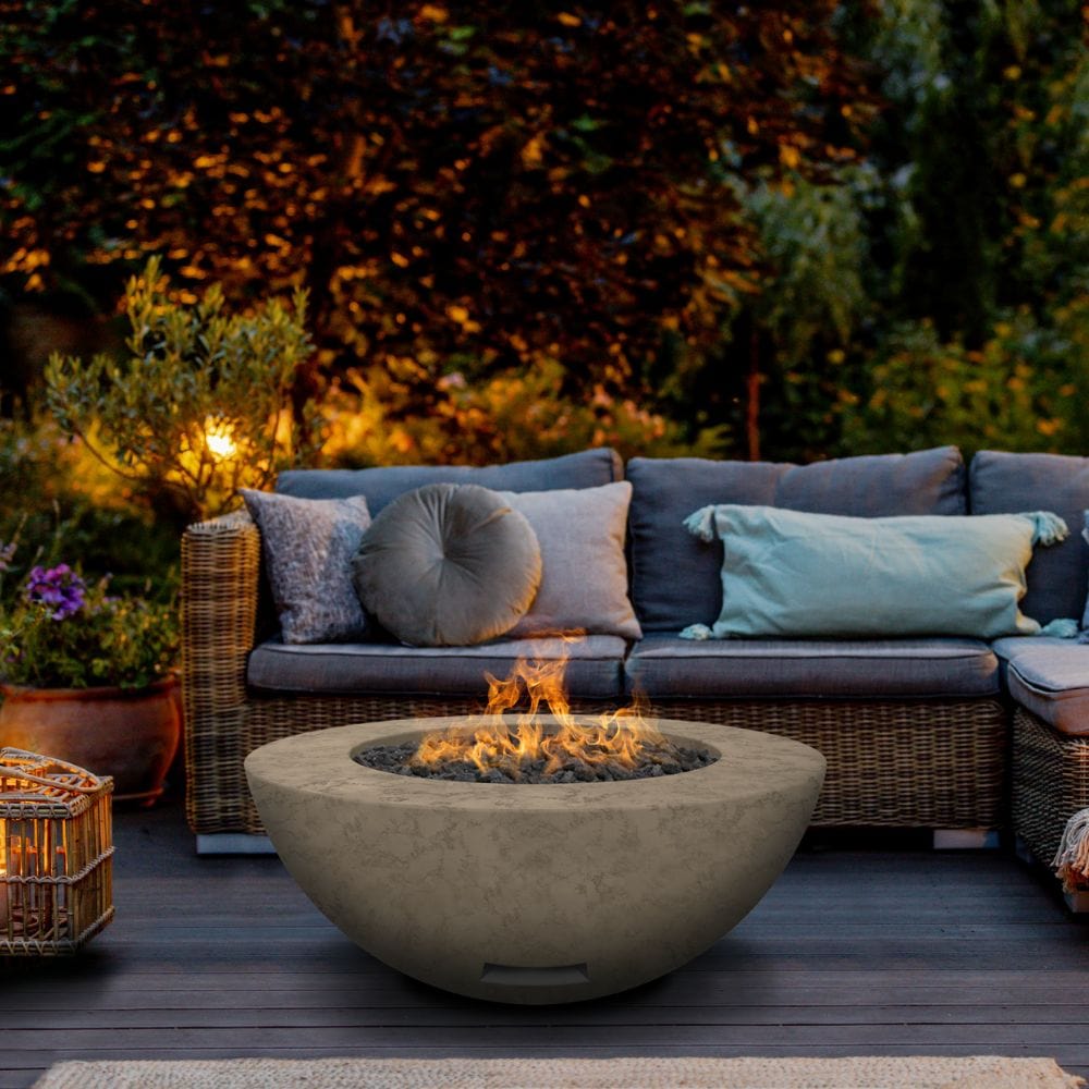 Modern Blaze Round Bone GFRC Gas Fire Bowl in Outdoor Patio - angle view