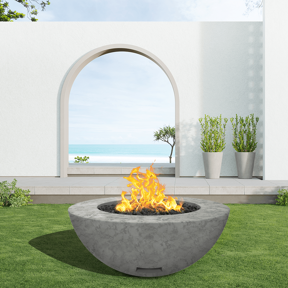 modern blaze round slate fire bowl with textured surface in a light outdoor setting - angle view