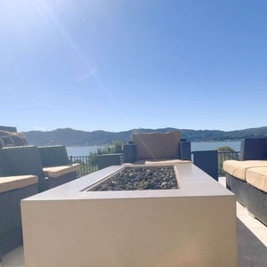 white linear gas fire pit table with scenic view