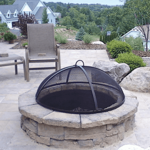 Modern Blaze Round Lift Dome Screen on Fire Pit in garden