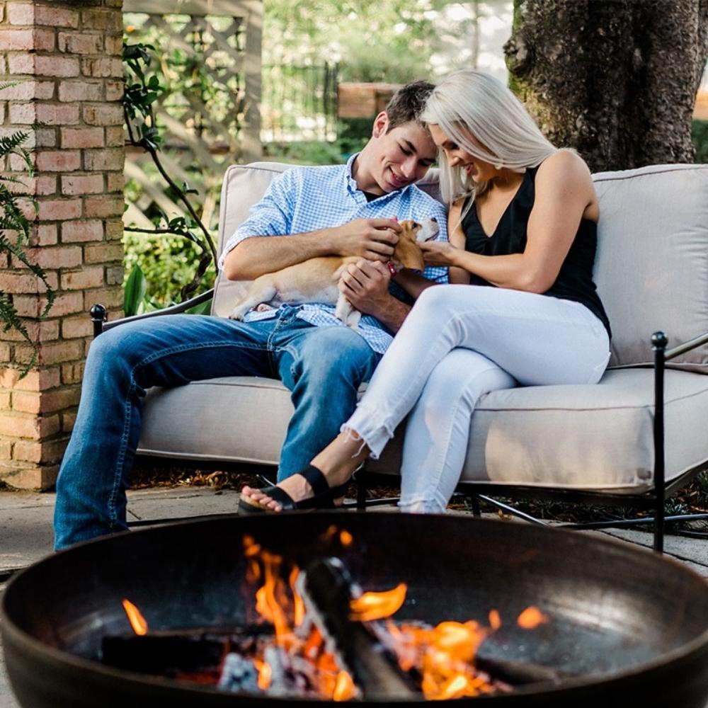 Seasons Fire Pits Vulcan Round Steel Fire Pit with Couple and Dog