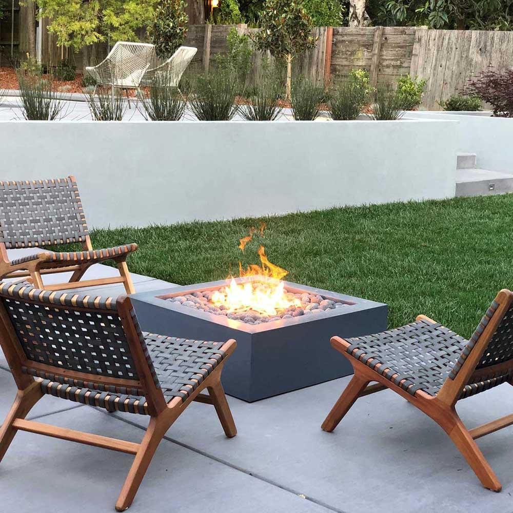 Top Fires Quad GFRC Gas Fire Pit in outdoor patio - detail view