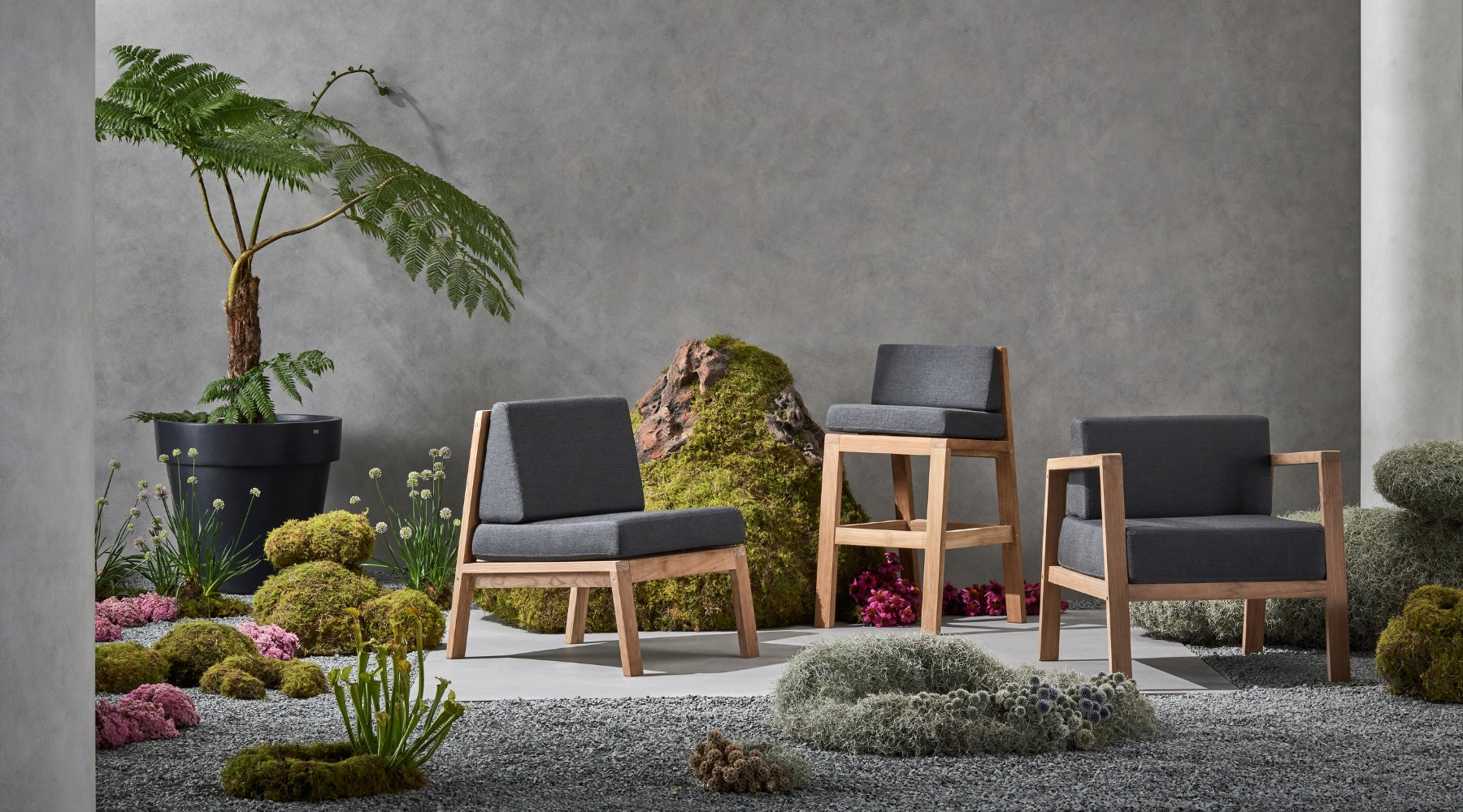 Blinde Design SIT Chairs in an outdoor setting