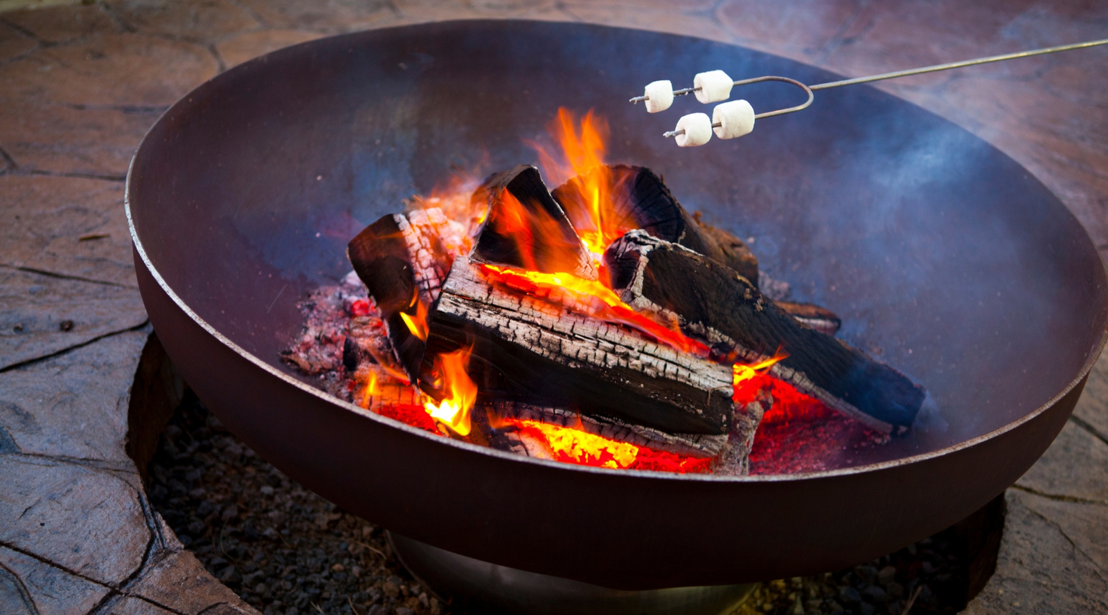 roasting marshmallows on an ohio flame fire pit
