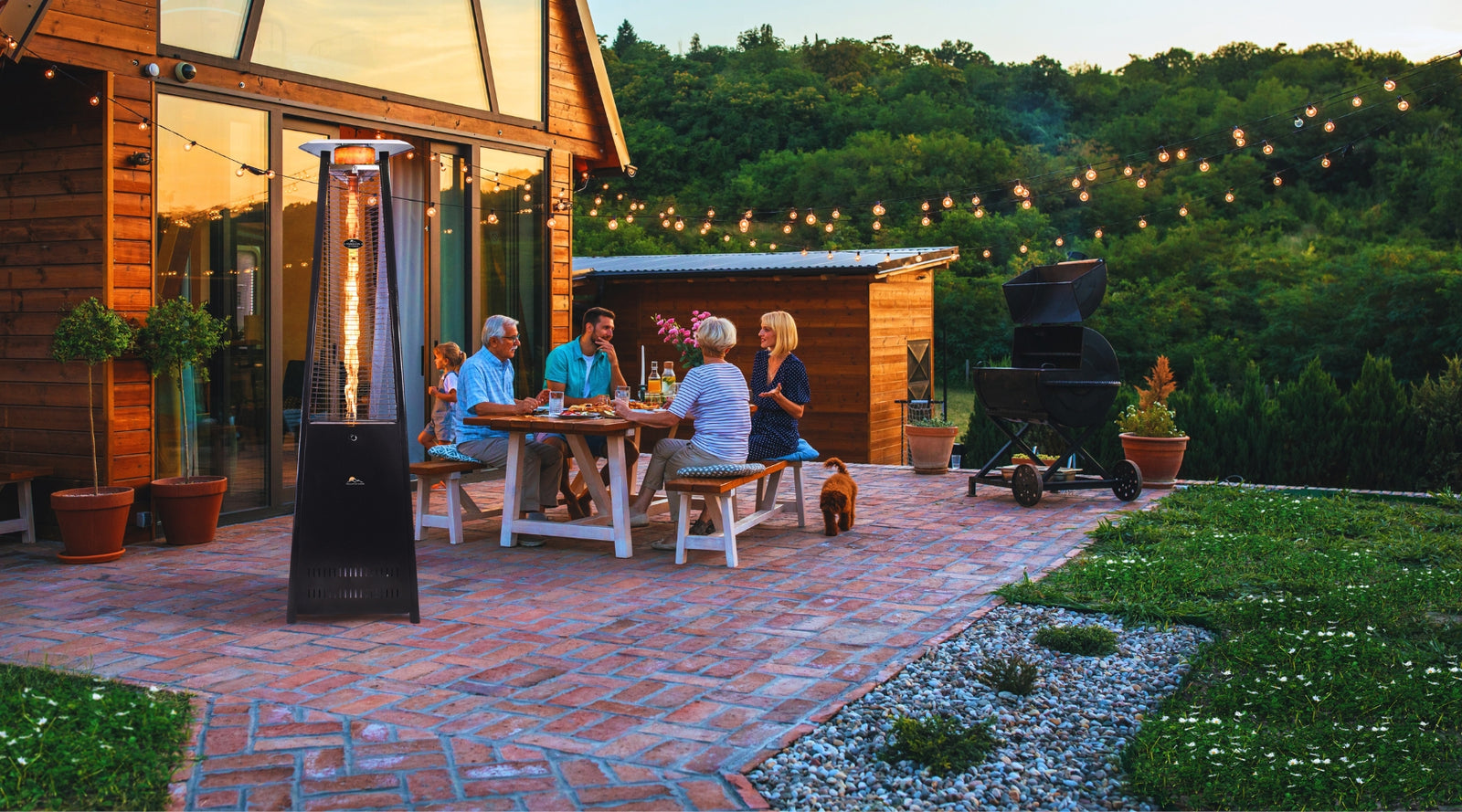 Paragon Outdoor Heater on a patio with family gathering