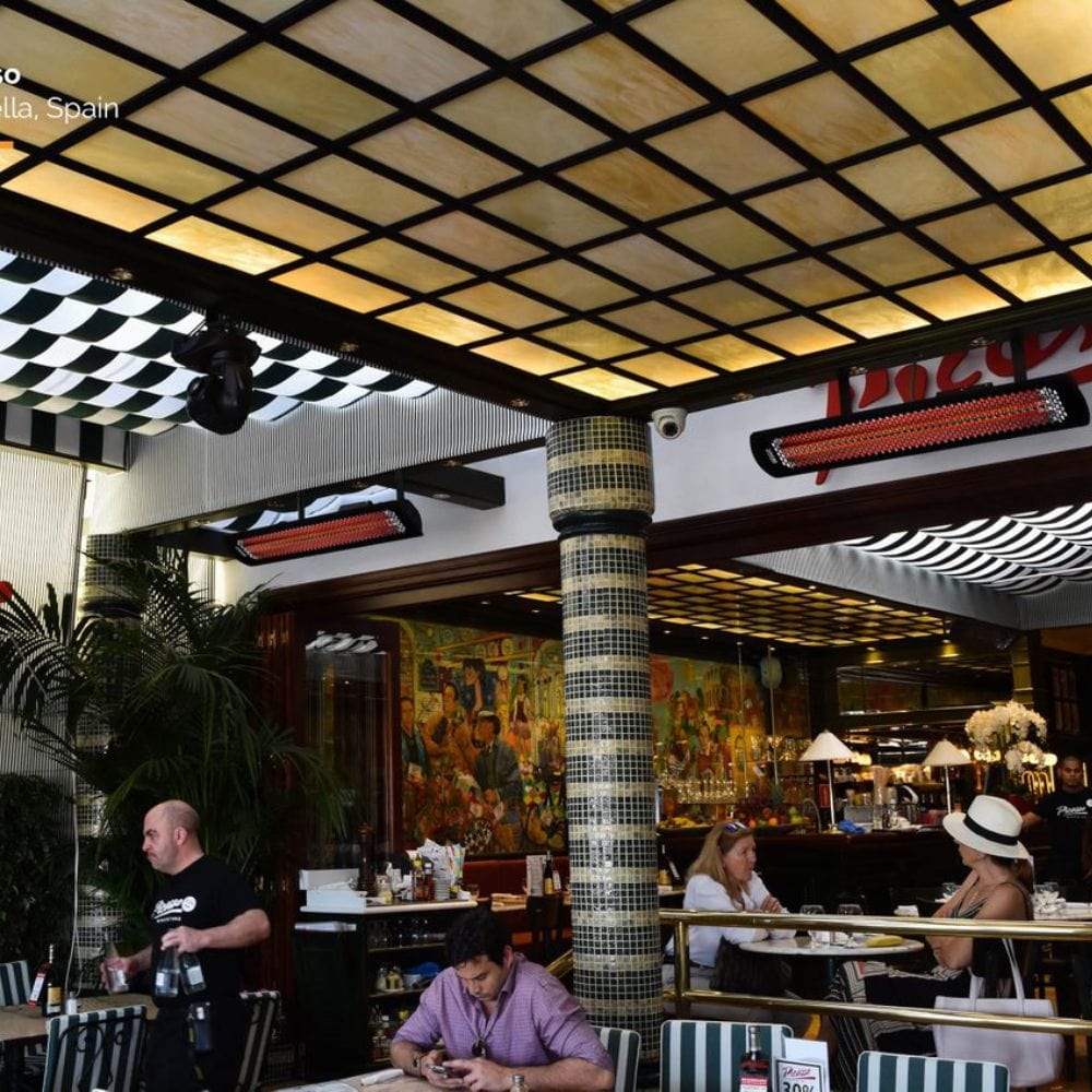 Black bromic tungsten smart-heat electric patio heater in restaurant patio
