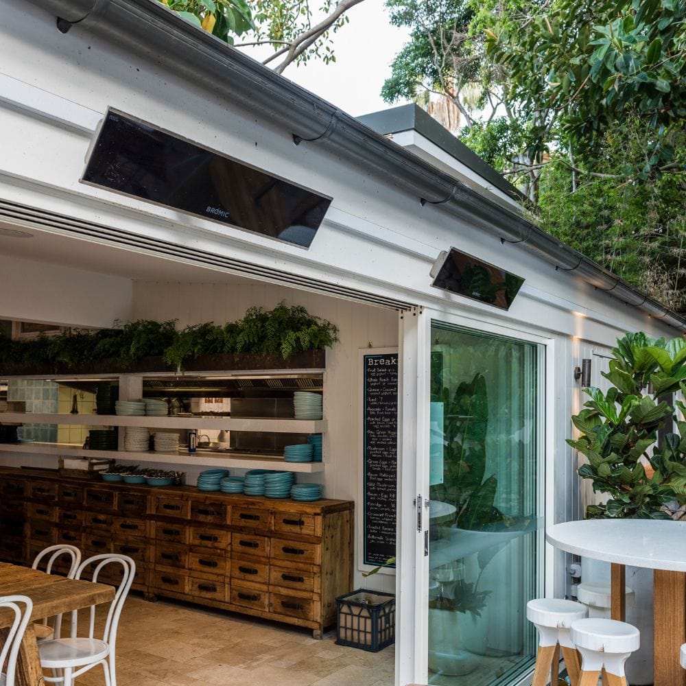 Bromic Platinum Smart-Heat Electric Patio Heater wall mounted in restaurant