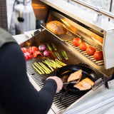 grilling salmon and vegetables on the American Made Grills Atlas 36 Built-In Gas Grill