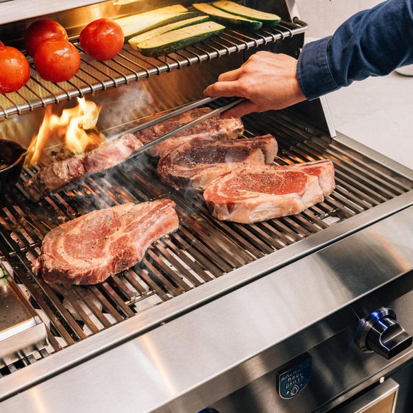 Searing steaks on the American Made Grills Estate 36 Gas Grill - close-up view