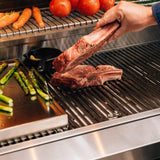 Grilling steaks on the American Made Grills Estate 42 Gas Grill