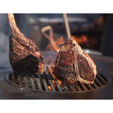 Grilling steaks on an arteflame grill grate
