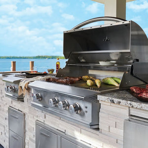 Blaze Professional LUX 3-Burner Gas Grill installed on a kitchen counter by the lake
