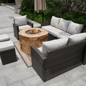 Direct Wicker 40-Inch Round Tree Stump LP Fire Pit Table in backyard