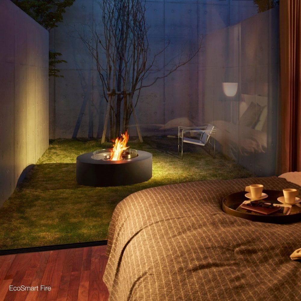 ecosmart fire ark black fire pit table in an outdoor space