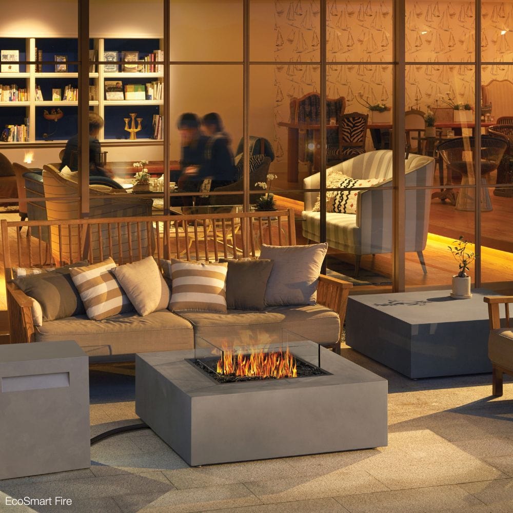 ecosmart fire base 40 gray fire pit table in a restaurant