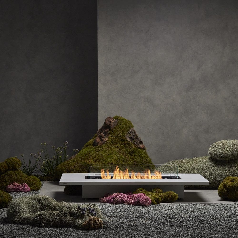Daiquiri 70" Fire Pit Table in the zen garden