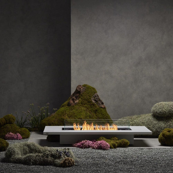 Daiquiri 70" Fire Pit Table in the zen garden
