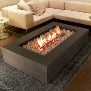 ecosmart fire wharf gray fire pit table in a living room