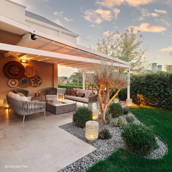 ecosmart fire wharf gray fire pit table under a pergola