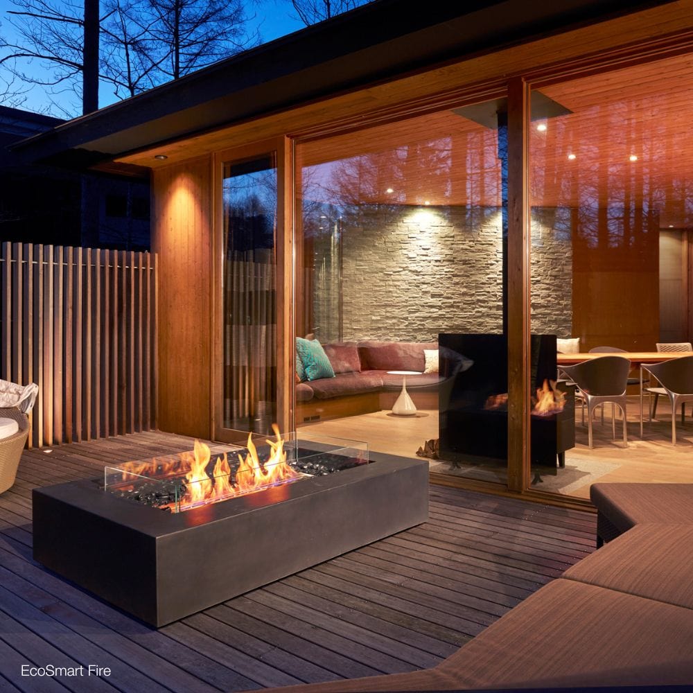 ecosmart fire wharf gray fire pit table on a patio deck