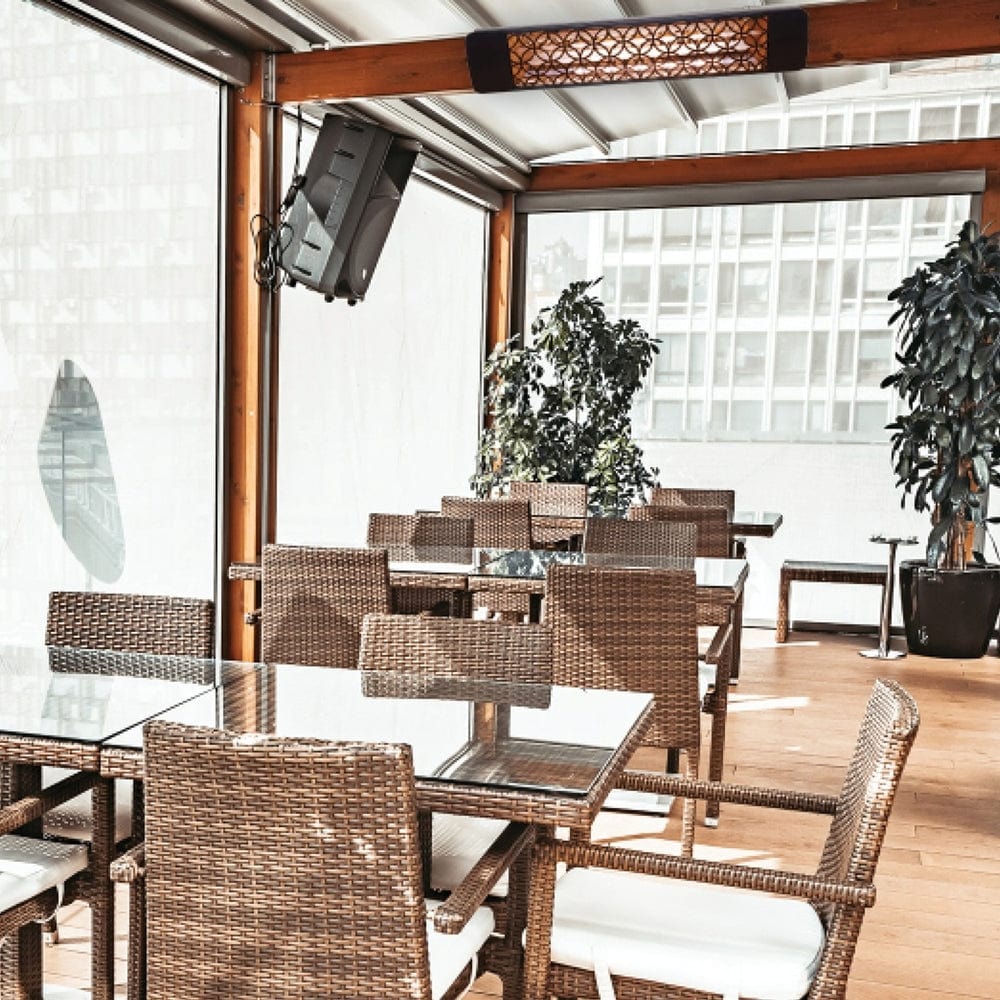 Eurofase 1500W 39&quot; Infrared Electric Heater mounted on a beam at a restaurant