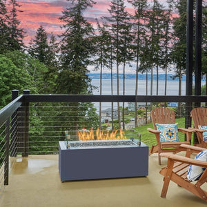 Fire Garden 48-Inch Rectangular Powder-Coated Steel Natural Gas Fire Pit on a terrace overlooking the lake