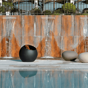 focus bubble fire pit beside the pool