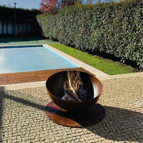 GlammFire Solace Wood Burning Fire Pit at Outdoor near Pool