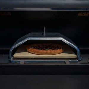 Green Mountain Grills Wood-Fired Pizza Oven with Pizza being cooked