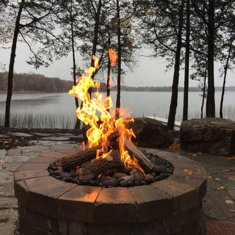 HPC Round Bowl Gas Fire Pit Insert in customized fire pit with wood - side view