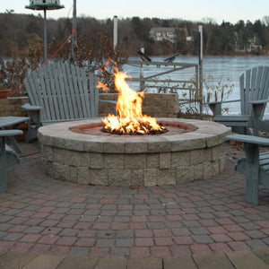 HPC Round Flat Standard Gas Fire Pit Insert in a low round fire pit by the lake