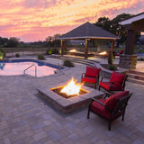 customized square fire pit by the pool - side view