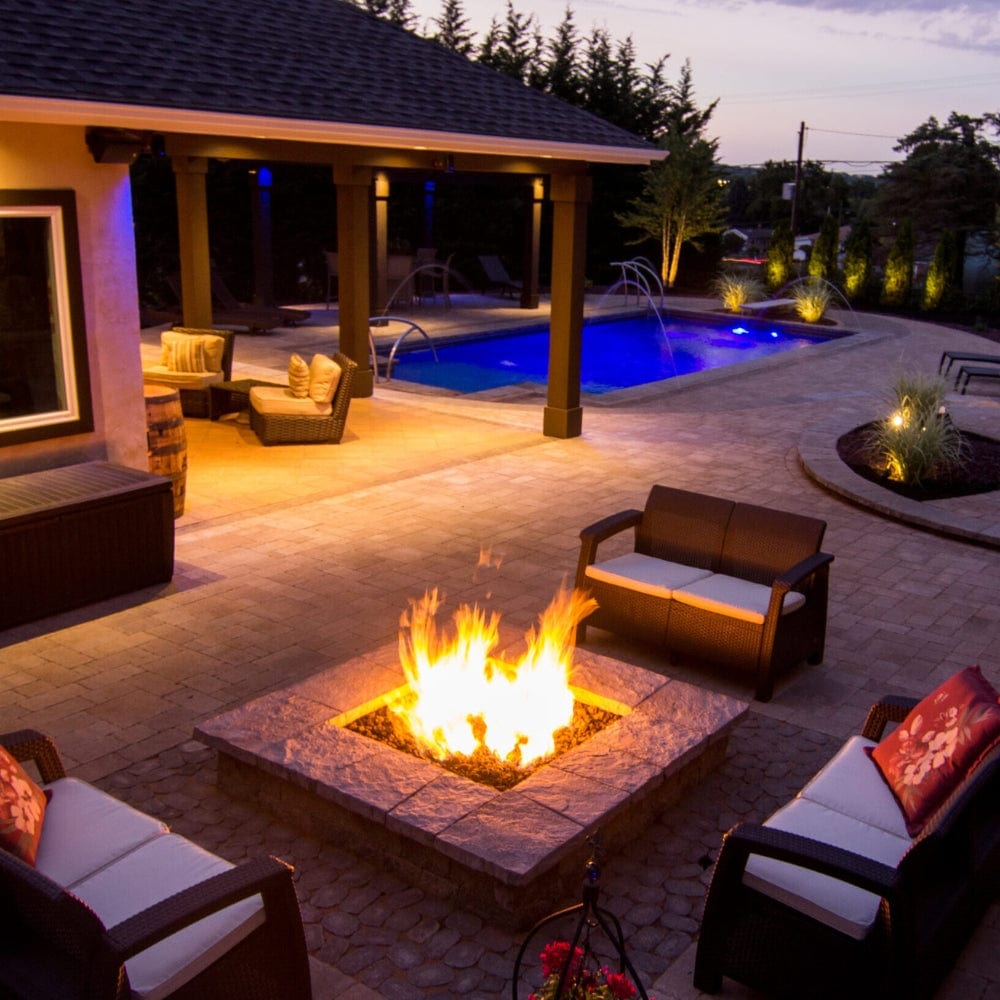 cozy square fire pit with seats around it - detail view