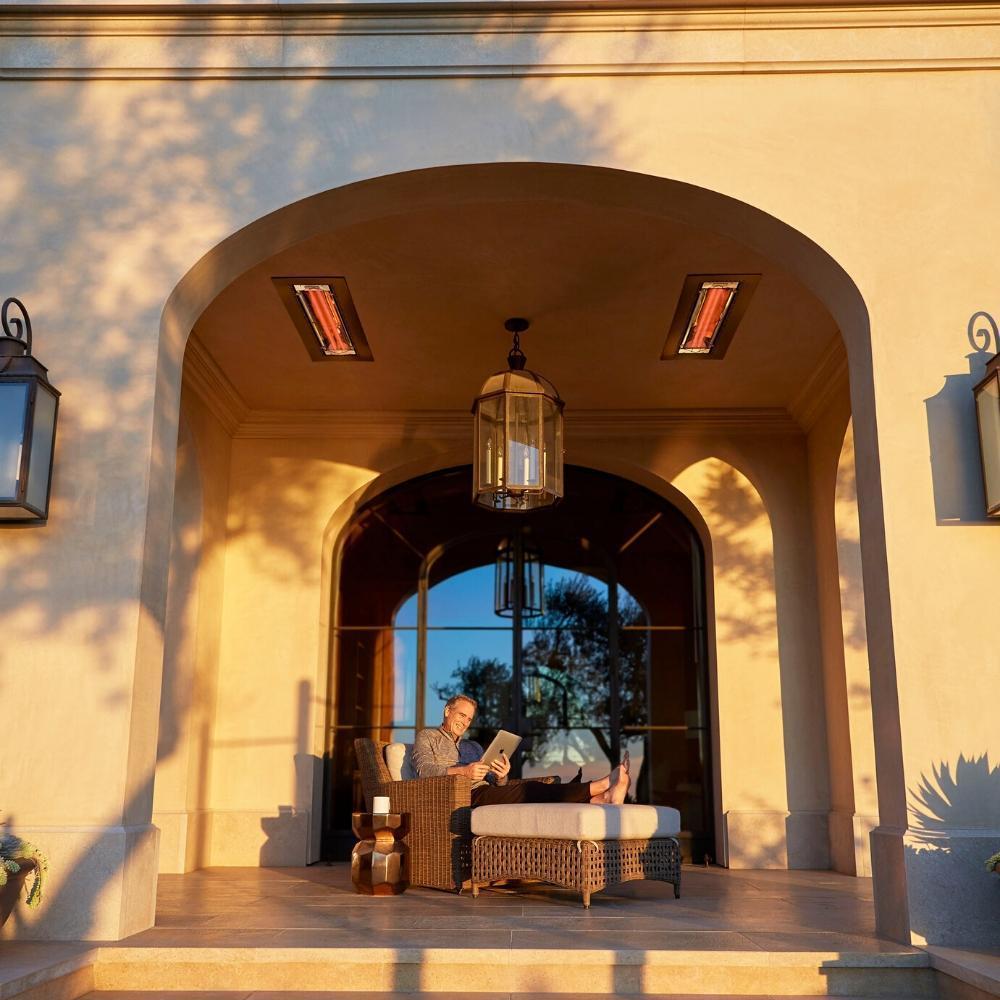 Infratech CD Series 61&quot; 6000W Dual Element Infrared Electric Heater with man reading