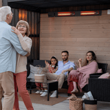 King Electric SmartWave Infrared Radiant Patio Heater is installed at outdoor party. - lifestyle view