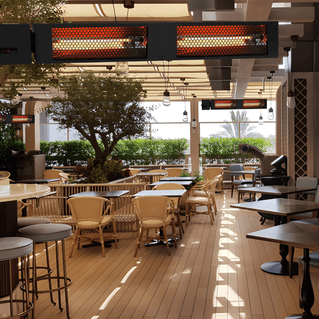 King Electric SmartWave Infrared Radiant Patio Heaters are installed at a commercial lounge. - side view