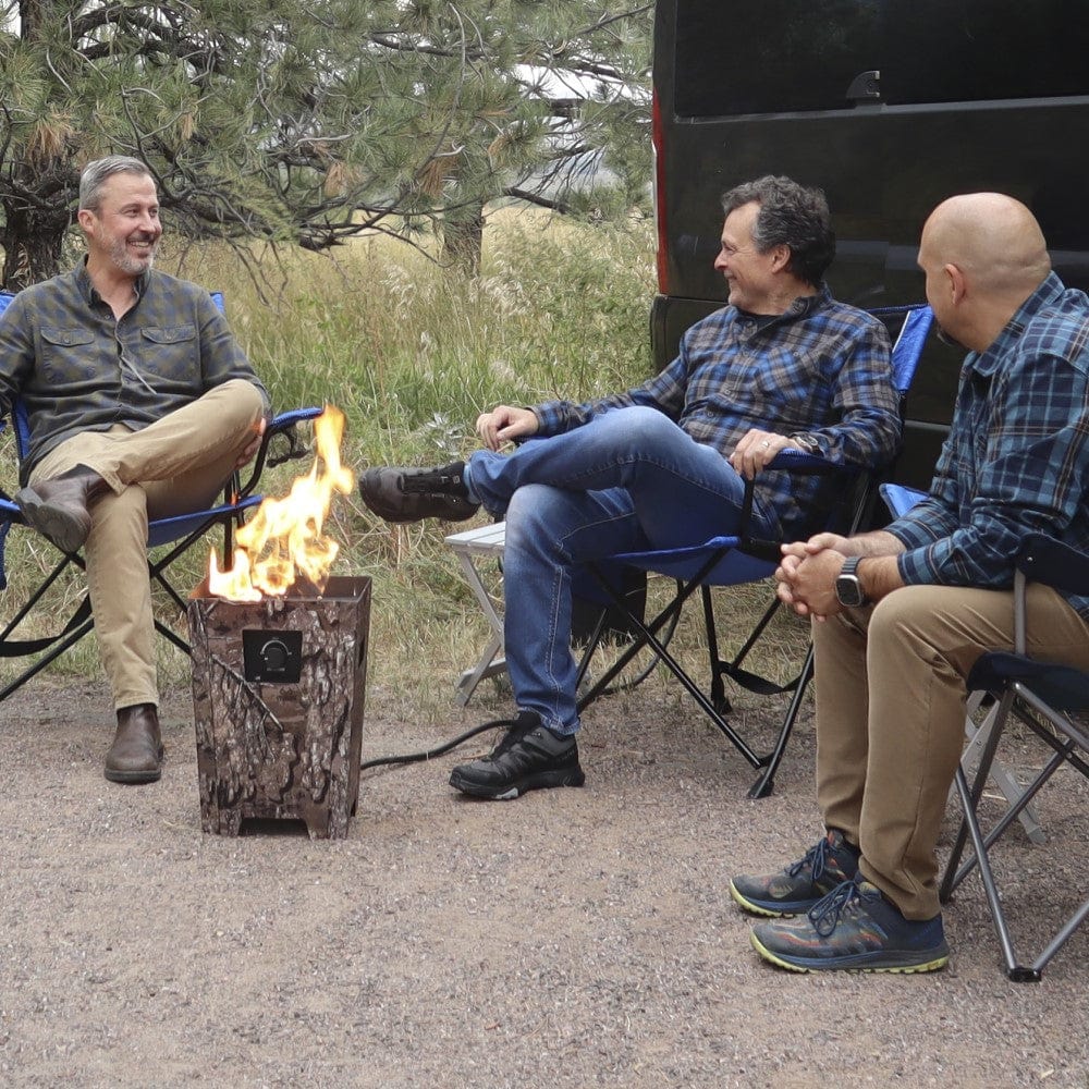 Live Outdoor Firestorm Series I Free Standing Fire Pit with the burner on, outside